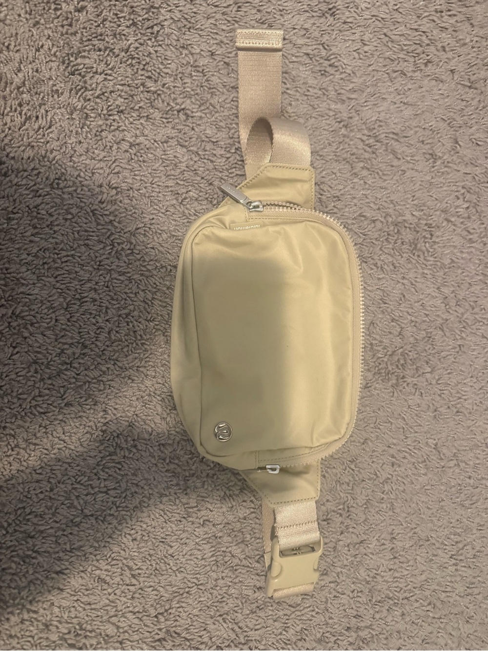 Beige Lululemon belt bag